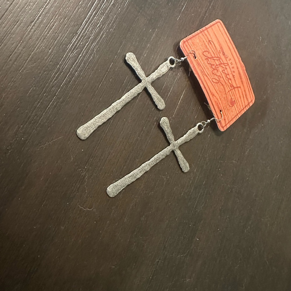 Southern fried chicks long silver cross earrings. Never worn. Brand new.